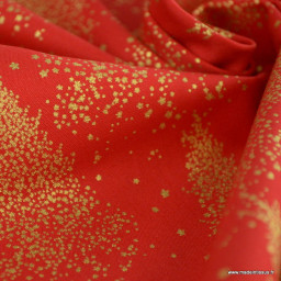 Tissu de Noël motif foret de sapins or fond rouge - Oeko tex