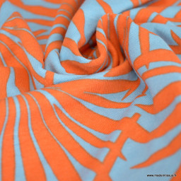 Tissu Jersey de Viscose motif exotique orange fond ciel - oeko tex