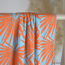 Tissu Jersey de Viscose motif exotique orange fond ciel - oeko tex