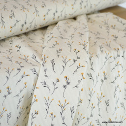 Tissu seersucker Jeanne à fleurs jaunes fond blanc cassé