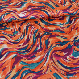 Tissu Viscose motif graphique Vagues oranges et pétrole