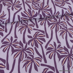 Tissu Viscose motif palmiers exotiques fond purple