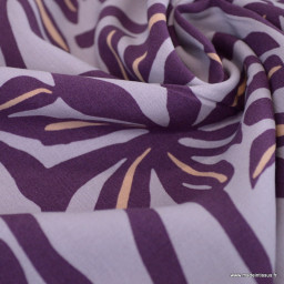 Tissu Viscose motif palmiers exotiques fond purple