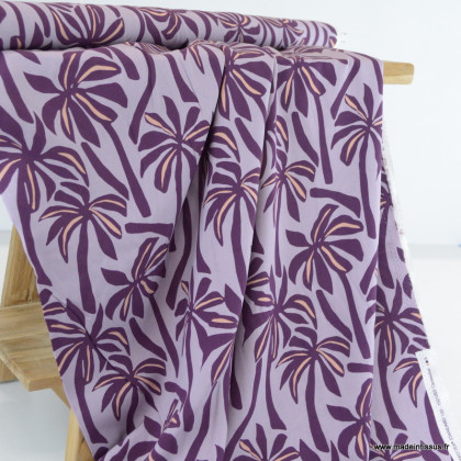 Tissu Viscose motif palmiers exotiques fond purple