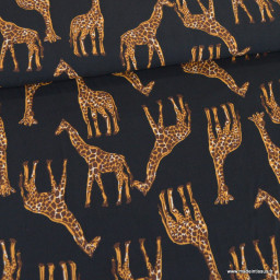 Tissu popeline de Viscose motif girafes fond noir