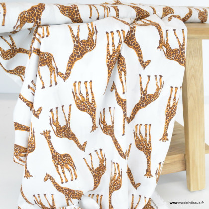 Tissu popeline de Viscose motif girafes fond Blanc