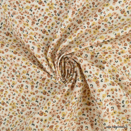 Tissu coton Enduit Ebbie motifs léopard fond écru