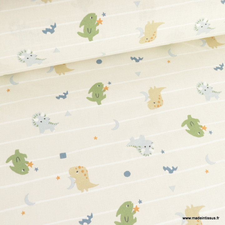 Tissu coton Dragmara motif Dinosaures fond gris clair - Oeko tex