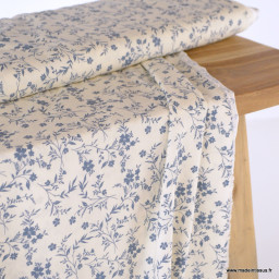 Tissu popeline de Viscose motif fleuri bleu fond blanc cassé