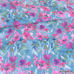 Tissu popeline de Viscose motif fleuri rose fond bleu