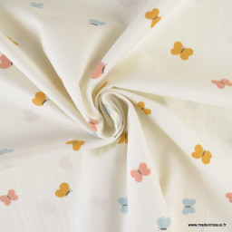 Tissu popeline motif papillons ocres, roses et bleues fond blanc cassé - Oeko tex