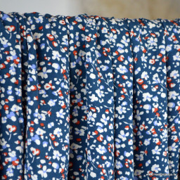 Popeline de viscose Vitalie motif petites fleurs fond bleu marine