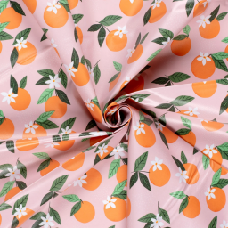 Toile cirée motif clementines fond rose