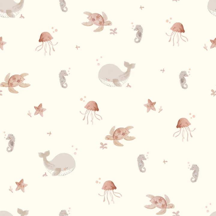 Tissu imperméable type ciré motif animaux de la mer fond blanc cassé