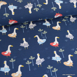 Tissu jersey motifs mouette qui surf fond bleu marine - Oeko tex