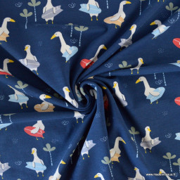 Tissu jersey motifs mouette qui surf fond bleu marine - Oeko tex