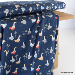 Tissu jersey motifs mouette qui surf fond bleu marine - Oeko tex