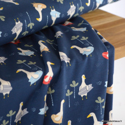 Tissu jersey motifs mouette qui surf fond bleu marine - Oeko tex