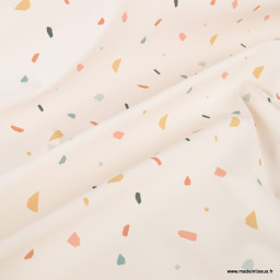 Tissu imperméable Miette type ciré motif Terrazzo fond écru