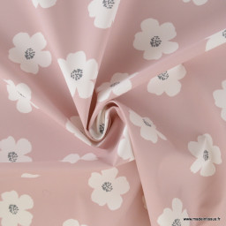 Tissu imperméable type ciré motif fleurs Jexy fond rose