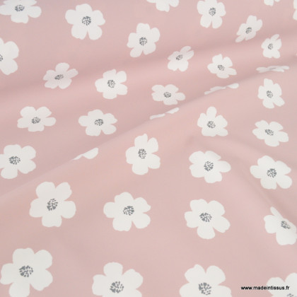 Tissu imperméable type ciré motif fleurs Jexy fond rose