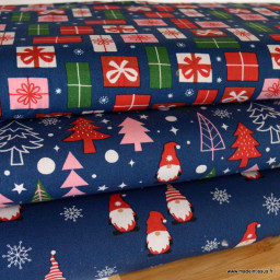 Tissu de Noël motif ésapins et Père Noël fond bleu marine - Oeko tex