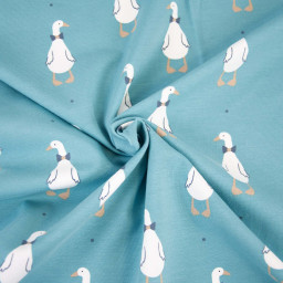 Tissu jersey motif canard fond bleu