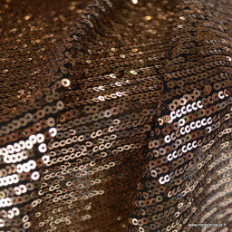 Tissu Sequin doré sur maille stretch