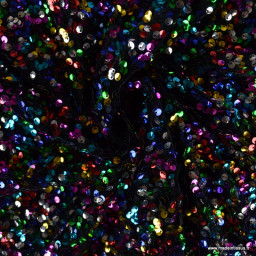 Tissu Sequin Multicouleurs sur velours noir