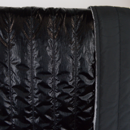 Tissu Matelassé vertical coloris Noir pour doudoune