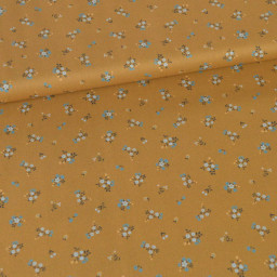 Popeline de coton Bisou motif fleurs bleues fond Ocre